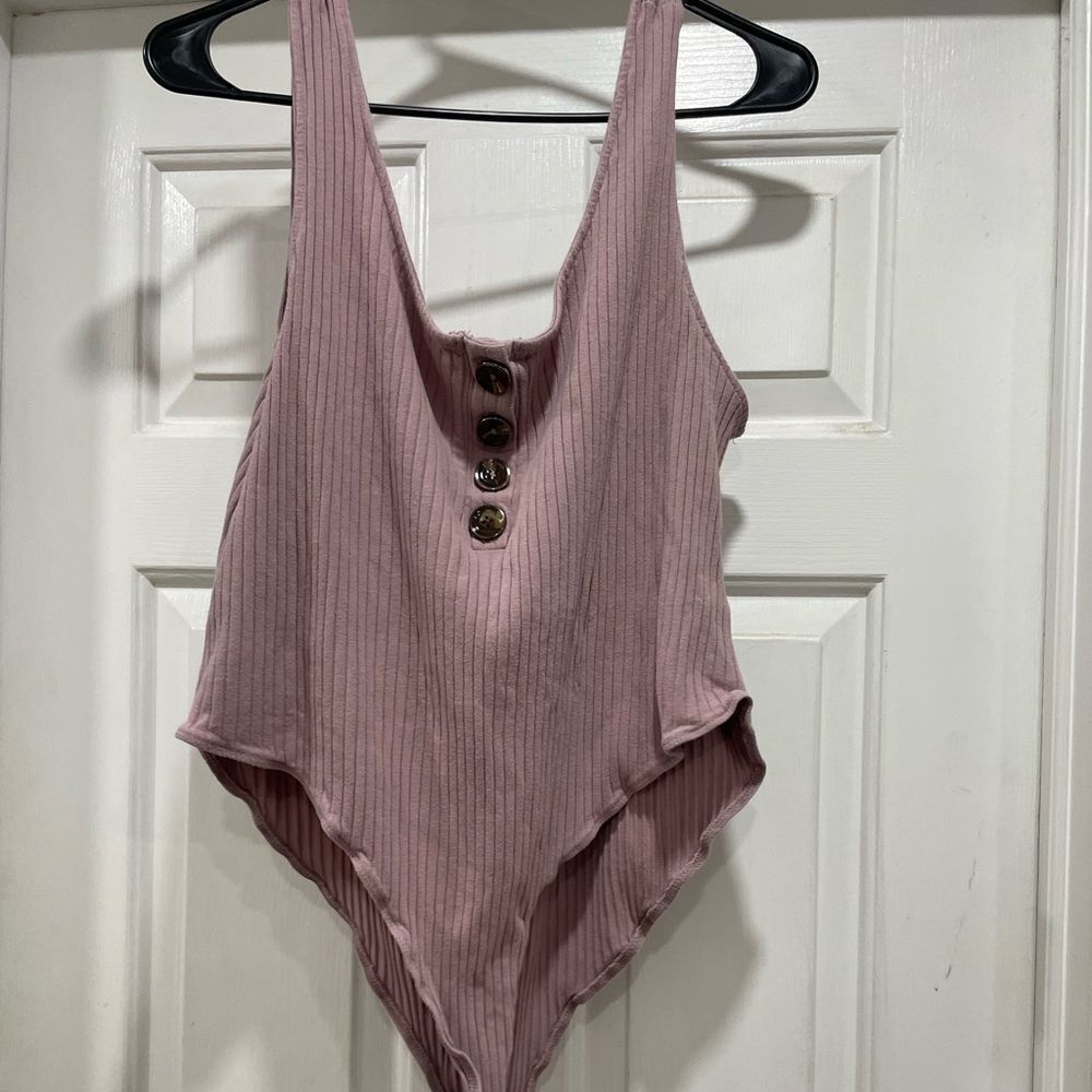Fashion Nova Body Suit Mauve Sleeveless body suit. Stretchy snap close size 3X